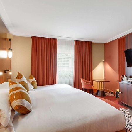 Nest Paris La Defense - Mgallery Puteaux Kültér fotó A room at the hotel