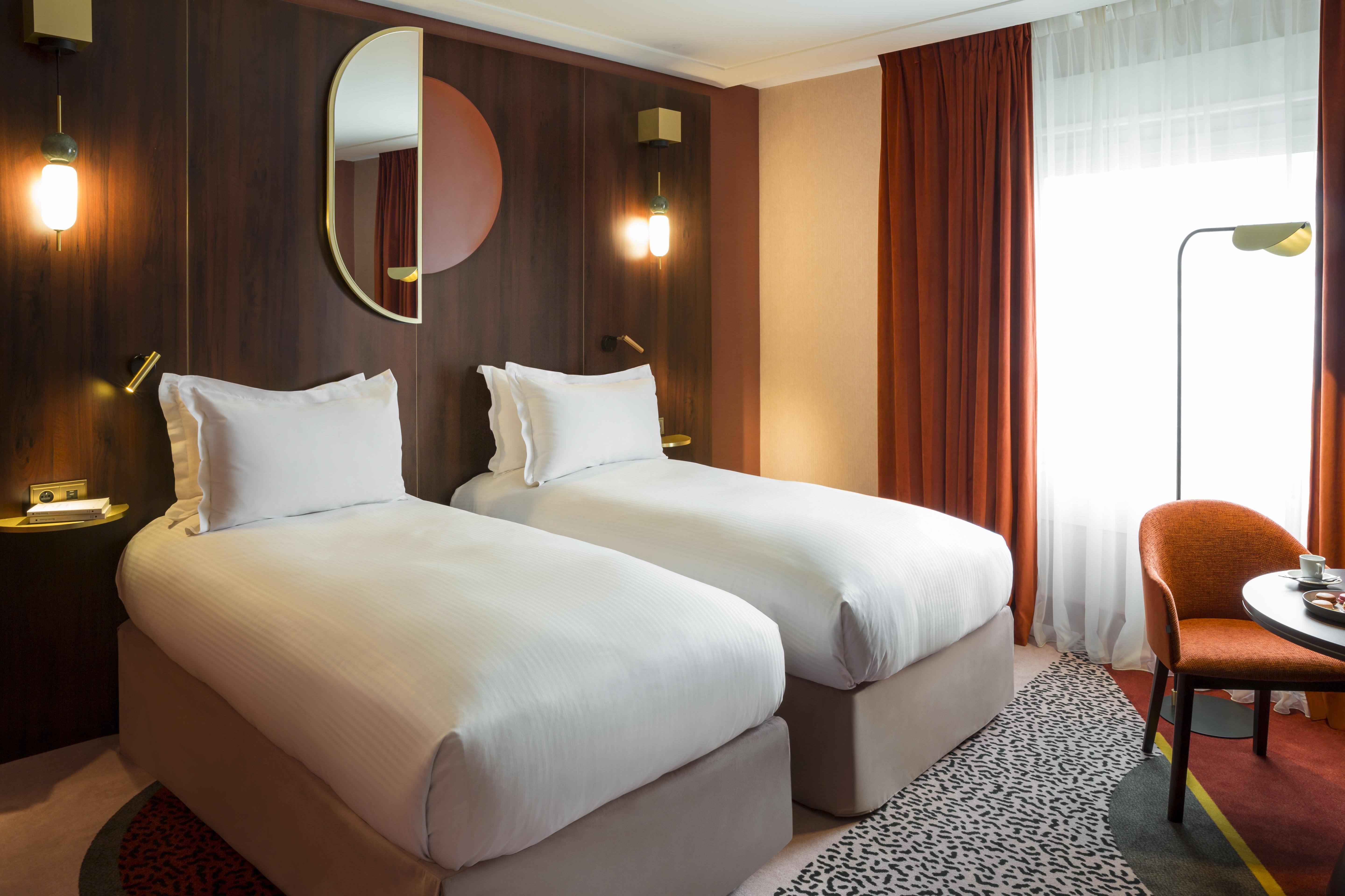 Nest Paris La Defense - Mgallery Puteaux Kültér fotó A room at the hotel